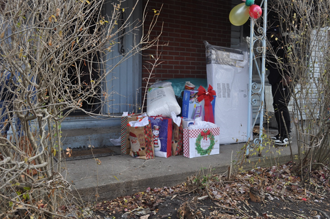 Wrapped Christmas gifts left on the porch